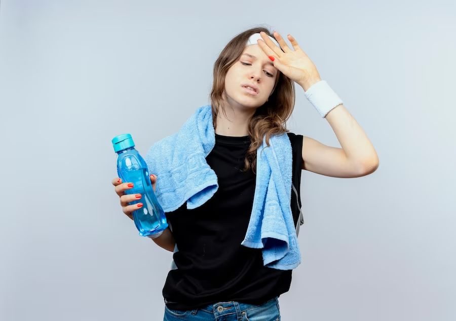 https://www.freepik.com/free-photo/young-fitness-girl-black-sportswear-with-headband-towel-around-neck-holding-bottle-water-looking-tired-standing-white-wall_12608448.htm#query=dehidration&position=2&from_view=search&track=sph